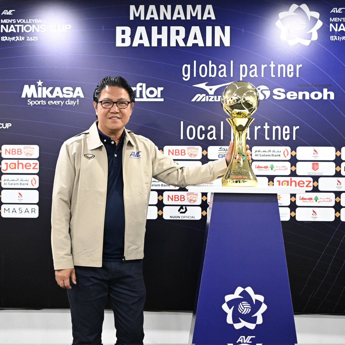 avcnationscup's tweet photo. Honored to have Mr. Ramon Suzara, AVC President, witnesses the excitement of the AVC Men's Nations Cup and shares a moment with the prestigious trophy. 

📺 LIVE : YouTube - Volleyball World 

#AMVNC2025 #AVCMenNationsCup #AVCVolley https://t.co/7P9XdPOce8