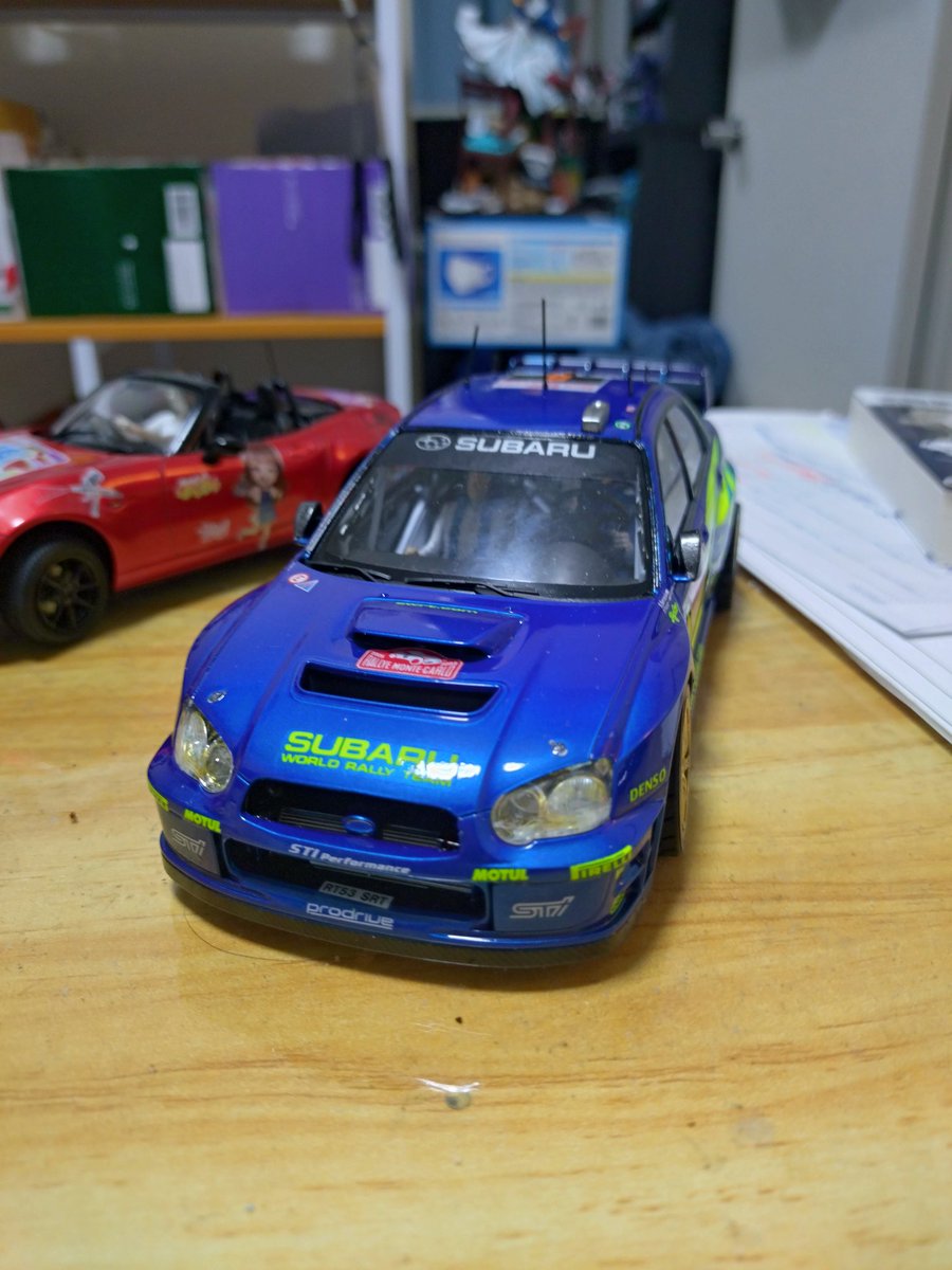 bxn02's tweet photo. タミヤ1/24スバル　インプレッサWRC
カーモデルを本気で製作してみたキット、最後の最後にヘッドライト曇らせたのが残念😓
ついついドライバーを乗せたくなるのはキャラクターモデラーの性か😅 https://t.co/baWR5vb70E
