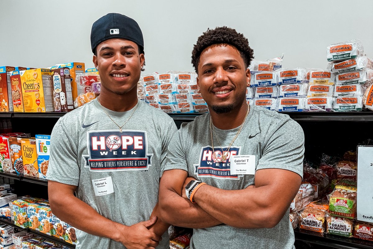 NYYPlayerDev's tweet photo. On the third day of #HOPEWeek, Florida Complex League (FCL) Yankee players went to @FeedingTampaBay to volunteer in The Market assisting community members with their shopping 💙🛒 https://t.co/Z2h2aO7Q0c