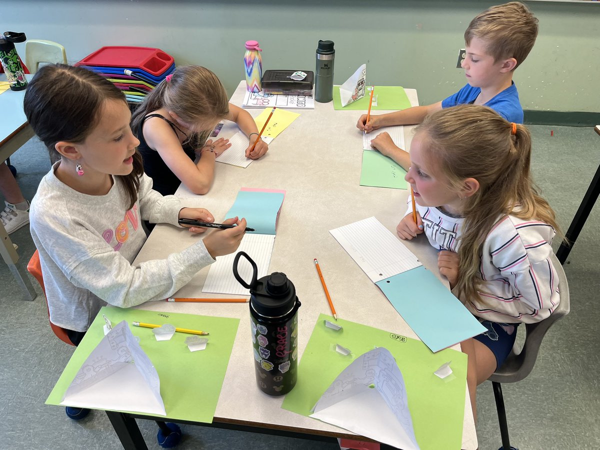 Leslie gave us exercise books and pencils to write our story!