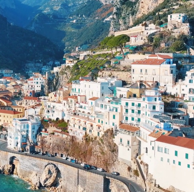 Clinging to the cliffs and kissed by the sea 💋 welcome to the stunning charm of Atrani on the Amalfi Coast 🌊🇮🇹  #AmalfiCoast