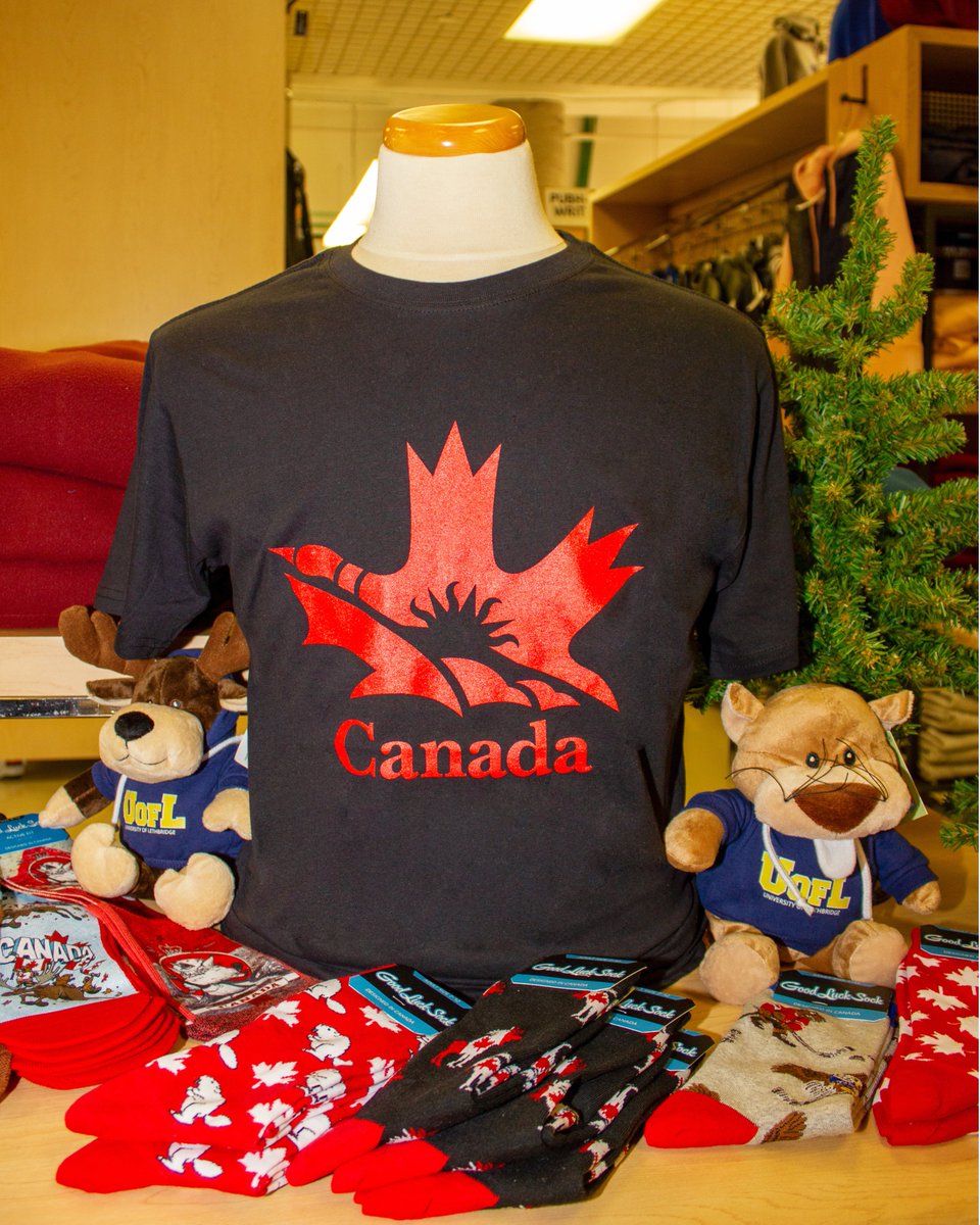 Pop by the Bookstore for all your Canada Day needs! 🇨🇦 From adorable Canadian animal stuffies to bold Good Luck Socks! AND don’t forget our tee featuring the rolling coulees, Canada goose, and iconic U of L sun ☀️ A must-have for repping ULeth &amp; Canada  July 1st!🍁