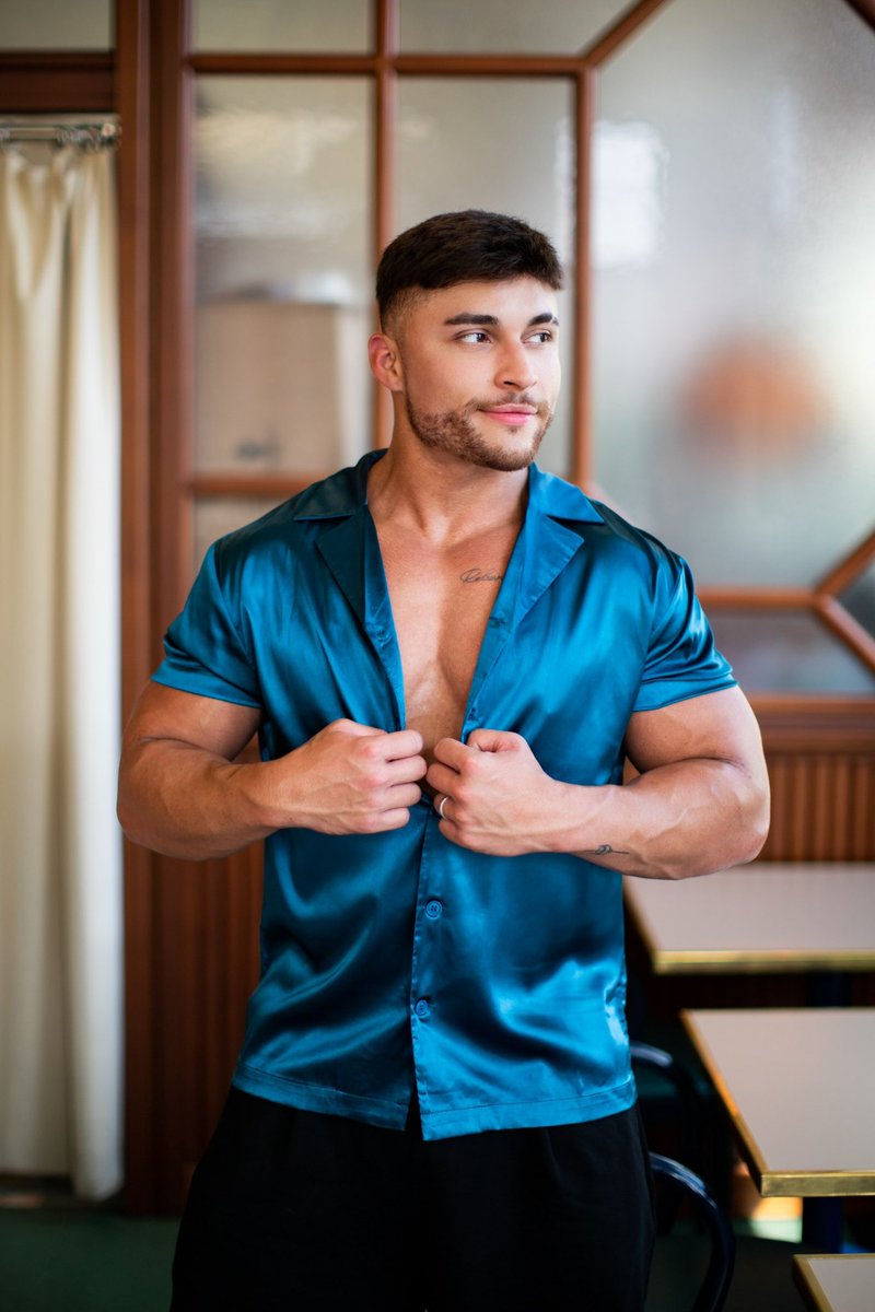 EnyeApparel's tweet photo. Whether you’re posted at golden hour or stepping into the night, this one does all the talking.

The Teal Satin Shirt with four way stretch coming Monday, June 30th #EnyeApparel #UNRESTRICTED 

https://t.co/jIznX1DKy3 https://t.co/qEqK1AIfGk