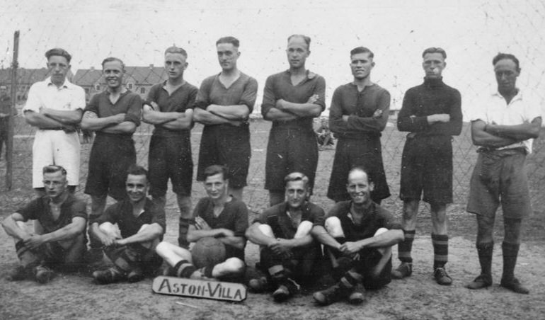 Group photograph of a 'Aston Villa' team, made up of British POWs at the Stalag XXID, Poznań, early 1940's. #AVFC