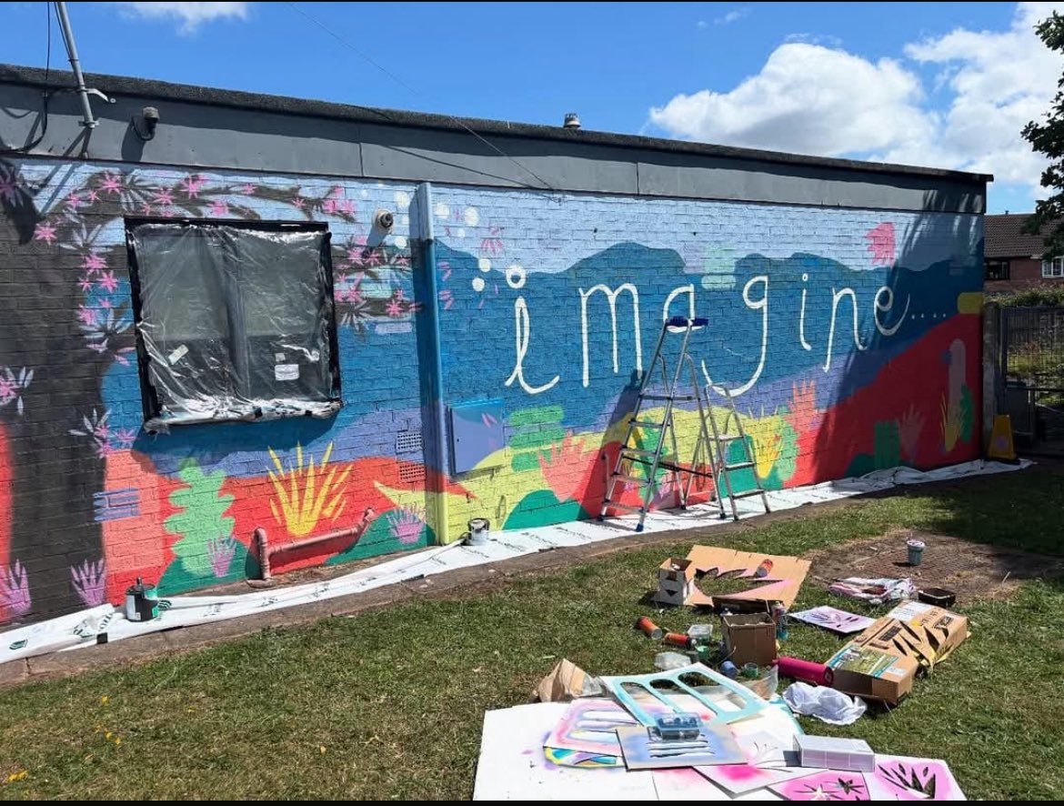 Our amazing mural based on the theme of Imagine for the Griffins Art Festival is starting to take shape. We’re so excited to see it completed. Can you imagine what else will be painted on it? #GriffinArtsFestival