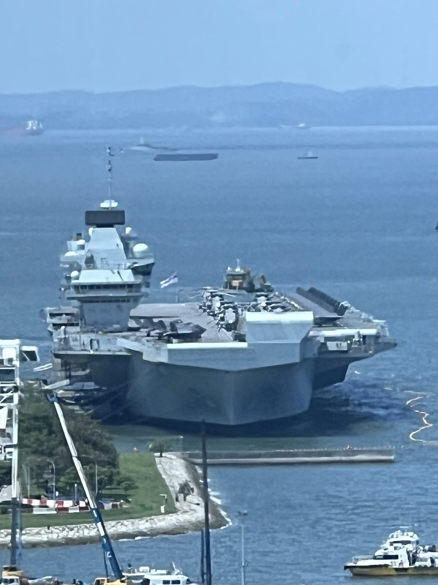 niravstoons's tweet photo. Since War is the topic - I noticed a British aircraft carrier parked in Singapore. It’s HMS Prince of Wales. 

Saw from office and went to take a closer look 

#AircraftCarrier #F35 #FighterPlanes 
#Singapore #HMSPrinceofWales https://t.co/ypuevJF4t3