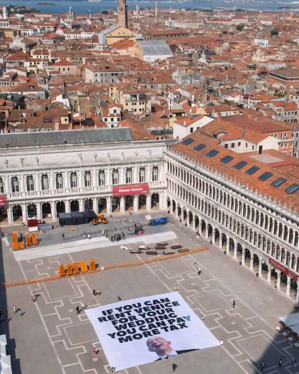 GreenpeaceNZ's tweet photo. While most of us can barely afford our energy bills, @jeffbezos can afford to shut down half of Venice for his wedding. Tax billionaires NOW. 

📍Piazza San Marco, Venice - near Jeff Bezos’s wedding 

#bezos #wedding #greenpeace https://t.co/uOwuD39YCb