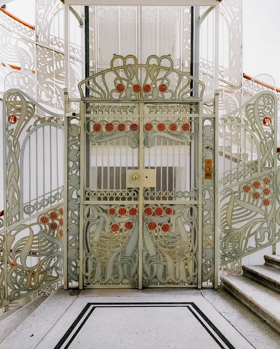 Art Nouveau style with a Tulip motifs elevator at Majolika House, Vienna