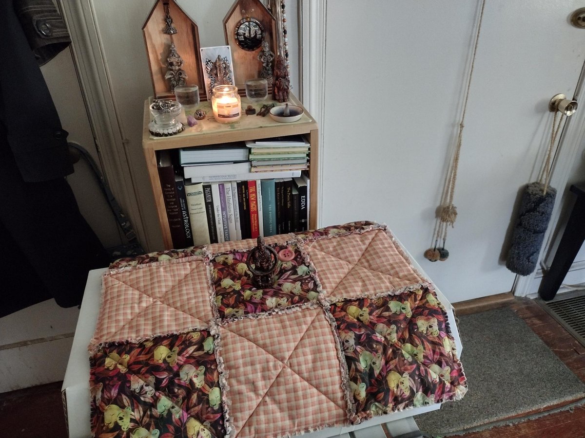 This is the memorial that we did for Heath. On top of his box is his blanket and the statue of Freya the cat goddess.