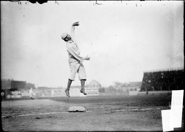 South Side Park, Chicago, 1905 - NY Highlanders third baseman Joe Yeager makes a valiant effort for a line drive
