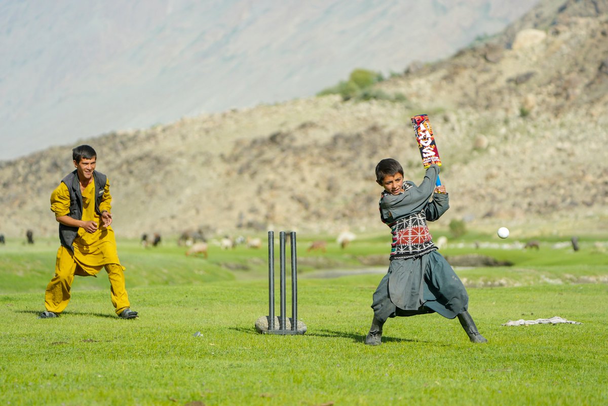 ICC's tweet photo. Children play cricket in Afghanistan’s Wakhan Corridor ahead of the National T20 Cup taking place in the remote region 👏🇦🇫

📸: @ACBofficials https://t.co/Y7NateMXa1