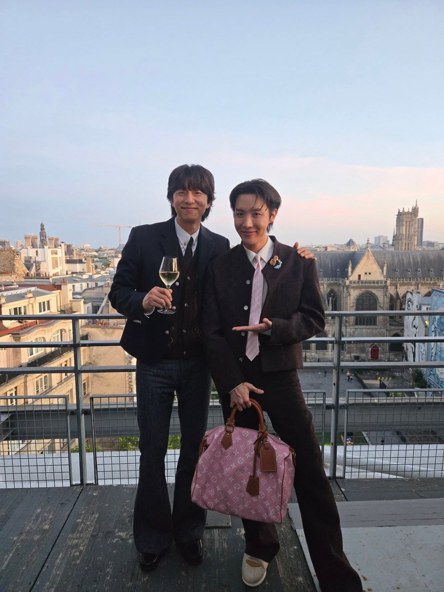 Gong Yoo and j-hope at the Louis Vuitton show in Paris.