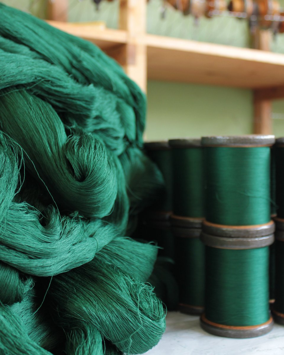 Gainsweaving's tweet photo. Stunning hanks of forest green.
This lovely mercerised cotton is being wound onto bobbin, ready for warping.
#gainsboroughweaving
.
.
.
.
#makingluxury #green #weavers #weaveshed #furnishing #luxuryfurnishing #inthemaking #interiordesign  #warping #colourinspriation https://t.co/C80inLJbnq
