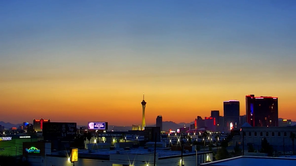 Slight haze in Las Vegas at sunrise from wildfires in Mexico and Southern Utah. Back to 100° today for the first time since Friday.
