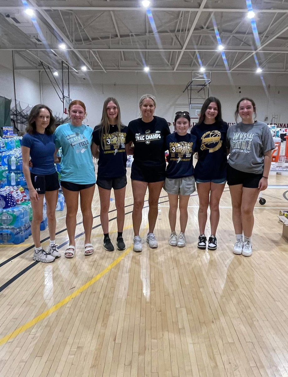 Some of our Lady Dragons volunteering at Wheeling University for flood relief.  💙💛