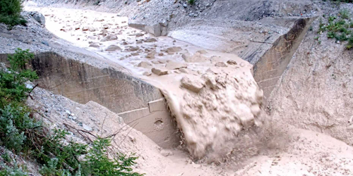 Researchers have developed a set of equations to describe fast muddy debris flows. Their model captures the dynamics of roll waves, a fluid-mechanical instability that causes surface waves to propagate in the direction of the flow. go.aps.org/40kvfL7