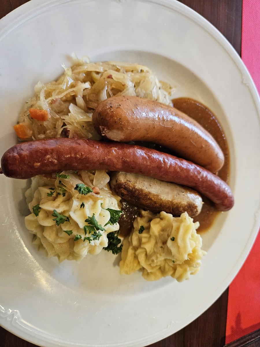 Berlin sausages with sauerkraut and potatoes in Berlin