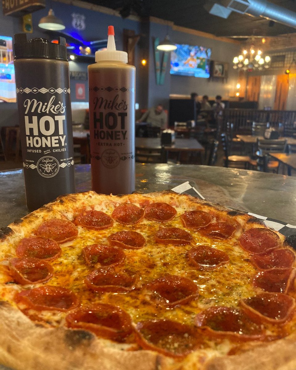 Add Mike's Hot Honey or Mike's Extra Hot Honey to your pizza!