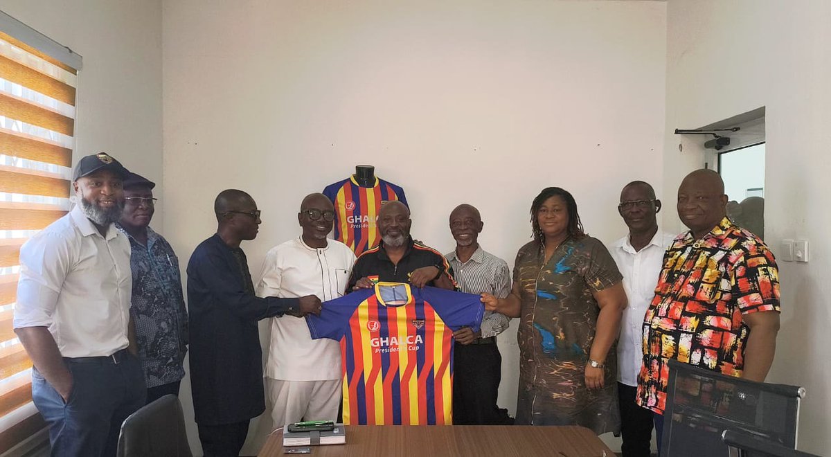 HeartsOfOakGH's tweet photo. 2025 President’s Cup: ...Organisers Present Matchday Jersey to Accra Hearts of Oak:

The Organisers of the 2025 President’s Cup, GHALCA paid a courtesy visit to the Commercial Centre of Accra Hearts of Oak as part of activities ahead of the prestigious fixture against arch-rivals Asante Kotoko.

During the visit, the Planning Committee officially presented the specially designed matchday jersey to the club. The jersey, proudly designed in the club’s traditional red, yellow, and blue colours, was handed over by the Chairman of the Planning Committee, Mr. John Ansah. 

It was received on behalf of the club by the Managing Director, Dr. Delali Anku - Adiamah.
The jersey was designed and printed by Kwab Asamoah of Kustomlooks Clothing, GH.
 
This year’s President’s Cup, scheduled for Sunday, July 6, 2025, at the Accra Sports Stadium, comes with a refreshing twist. The theme for this year’s edition focuses on environmental sustainability. 

As part of this initiative, GreenFutbol, in partnership with GHALCA and other key stakeholders, has made arrangements for an electric bus to transport both teams from their camping points to the match venue — a symbolic gesture to promote clean energy and climate consciousness in football.

Dr. Delali Adiamah expressed gratitude to the organisers and the jersey manufacturer:

“We thank the organisers, GHALCA and Mr. Asamoah, for their gesture, and I use this opportunity to call on all Phobians, far and near, to show up on 6th July and be the 12th player. Let’s come together to support Hearts and help lift Ghana football as these two great clubs do their part on the day on the pitch. The jersey is beautiful and well thought through. This is very traditional.”

The President’s Cup continues to honour the sitting President of Ghana while promoting unity, sportsmanship, and environmental responsibility — with Hearts of Oak and Asante Kotoko ready to write another exciting chapter in their legendary rivalry books.