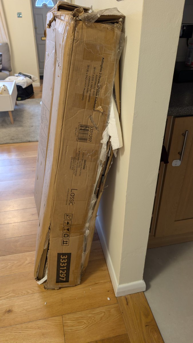 T4YLOR_'s tweet photo. @DX_delivery Someone better contact me with a bloody good reason why our packages look like this. Fucking awful. https://t.co/FV532N9yK4