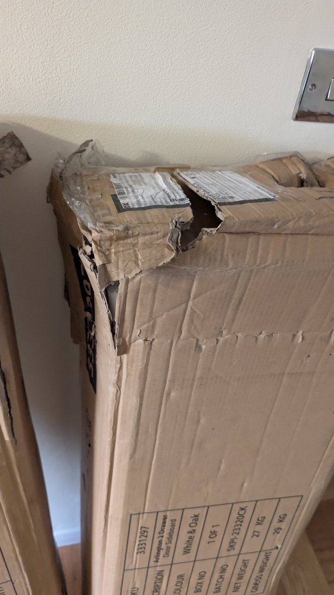 T4YLOR_'s tweet photo. @DX_delivery Someone better contact me with a bloody good reason why our packages look like this. Fucking awful. https://t.co/FV532N9yK4