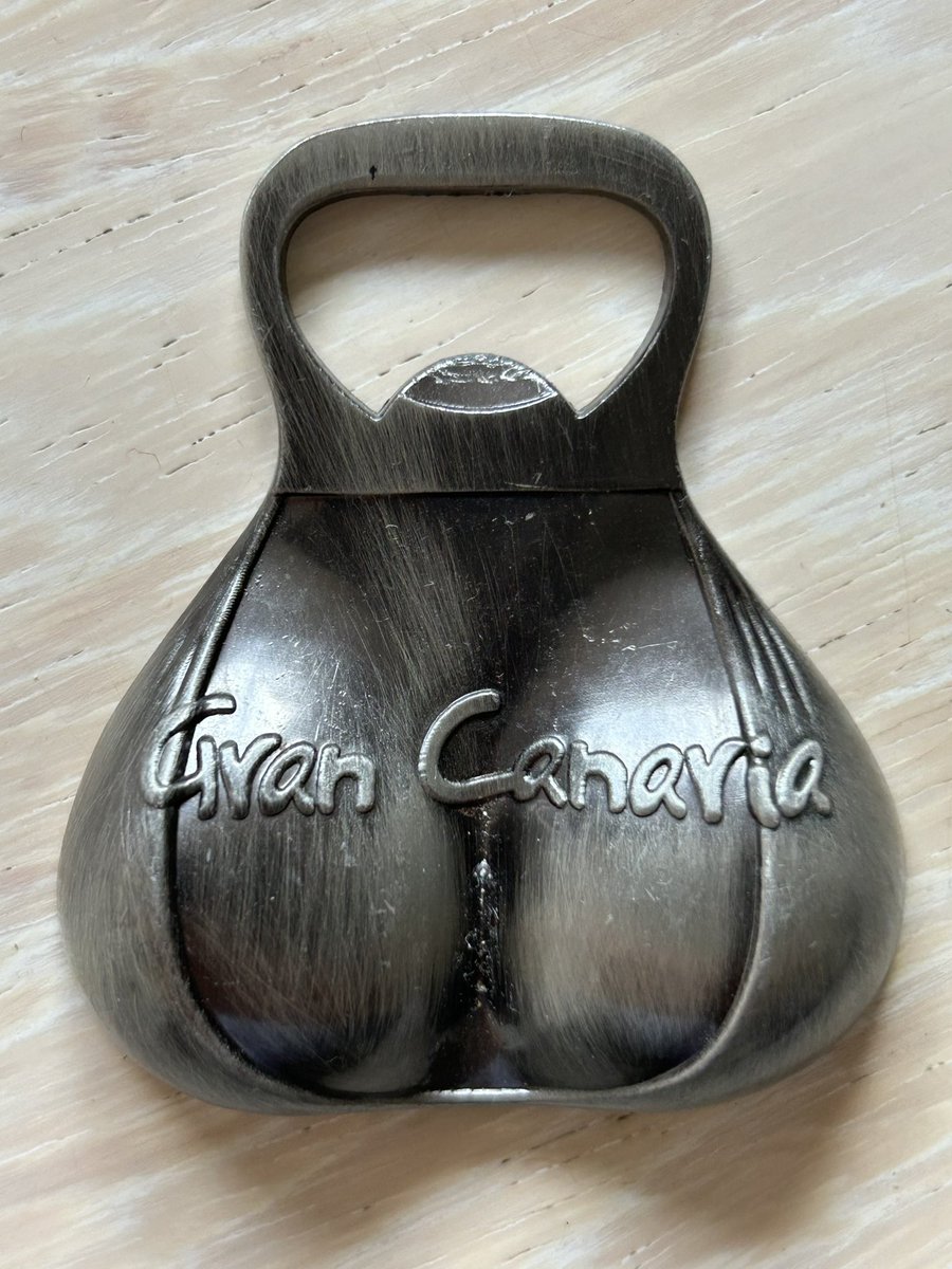 Charity shop bottle opener <a href="/TatTrove/">Tat Trove (Charity Shops Out of Context)</a>