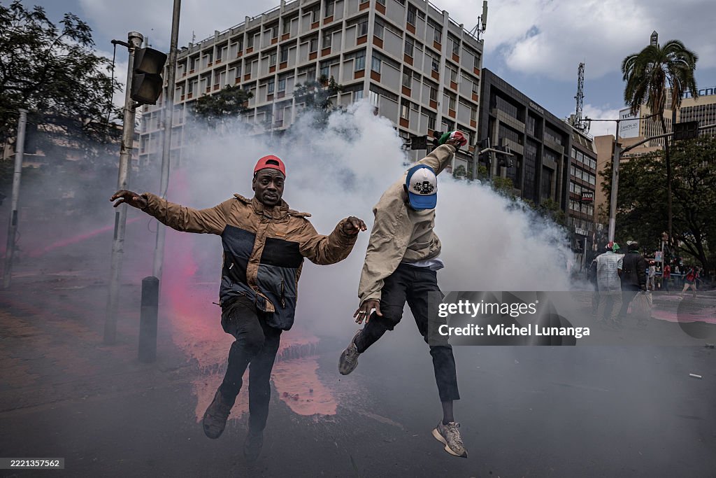 GettyImagesNews's tweet photo. A protester walks into tear gas during the Gen Z protest in Nairobi, #Kenya. Demonstration marks the first anniversary of the 2024 anti-government protests against the Finance Bill that left more than 60 people dead. 📷: Michel Lunanga #KenyaProtests https://t.co/aYrnKDHAZu