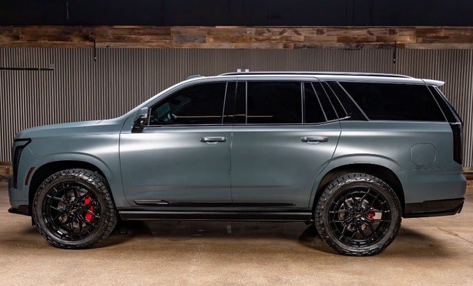 liftedtrucks's tweet image. 2025 Supercharged Cadillac #Escalade V from our McKinney #Texas location. Mean! 🖤🔥 #TX04443A 

*55” pillar to pillar display
* 682 horsepower supercharged V8 
* 24” @vossenwheels  
* @NittoTire Recon Grapplers 
* Messaging leather seats
* Super Cruise™️ 
Much Much More!!!