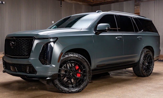 liftedtrucks's tweet image. 2025 Supercharged Cadillac #Escalade V from our McKinney #Texas location. Mean! 🖤🔥 #TX04443A 

*55” pillar to pillar display
* 682 horsepower supercharged V8 
* 24” @vossenwheels  
* @NittoTire Recon Grapplers 
* Messaging leather seats
* Super Cruise™️ 
Much Much More!!!