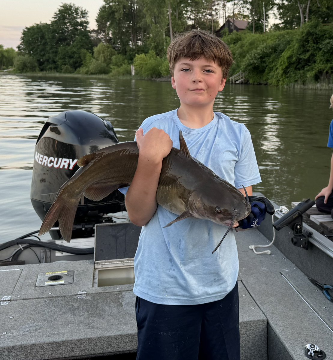 FishingFather44's tweet photo. So proud of my boy. I go off to get a pizza and he catches and nets this all on his own. I get back and he says, “Dad I have something to show ya!” Not bad for a 10 year old. #lakechamplain #channelcatfish https://t.co/4au7iYgJiq