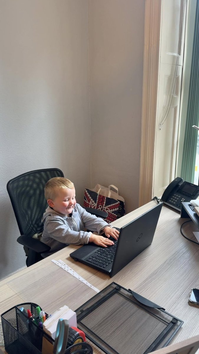 When Registered Manager Katie is out in the community, she ensures the office is covered and everyone is supported. It's always a joy when her almost 3-year-old, Ezra, visits—especially when he helps answer calls (with a biscuit break, of course).

Well done, Ezra!
