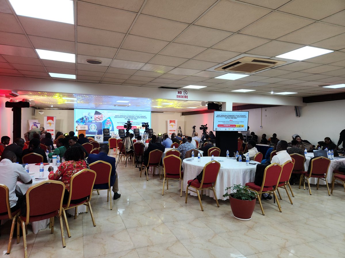 StartboomD's tweet photo. Happening right now @HotelAfricana is the 5th edition of the East African Community Post-Budget Dialogue for the Financial Year 2025/26 on Tax and Debt. 
Theme: Harmonization of Fiscal and Debt Policies to Boost Trade and Investment in the EAC. #SEATINIOnBudget25 https://t.co/fKV9a3KyN0