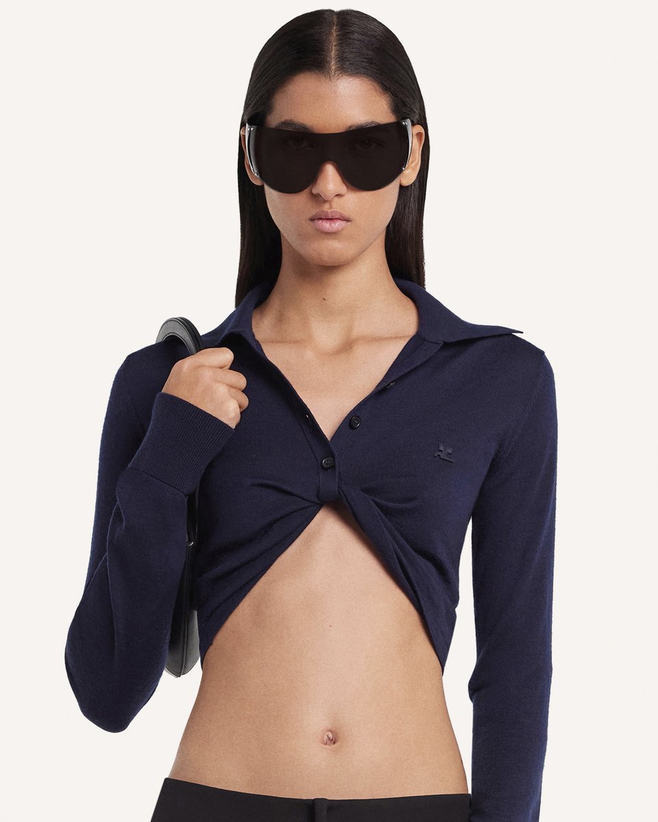 The Twist light wool cropped polo is now available online and in our stores.

#courregesSS25
#courreges