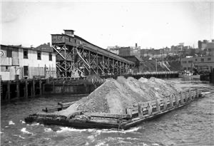 Seattle. 

Mudflood. 

33 years to dig out and clean up. 

“Starting in 1897 and continuing through 1930, the hilly topography of central Seattle was radically altered by a series of regrades, in what might have been the largest such alteration of urban terrain at the time.”