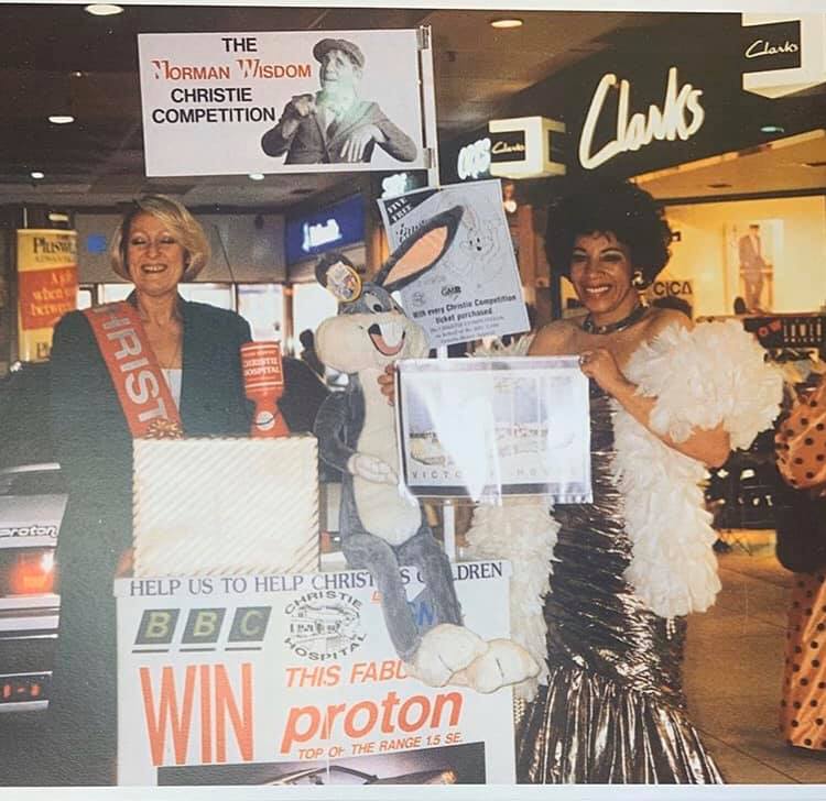 'Shirley Bassey' lookalike visiting Stretford's Arndale shopping centre, 1980s.