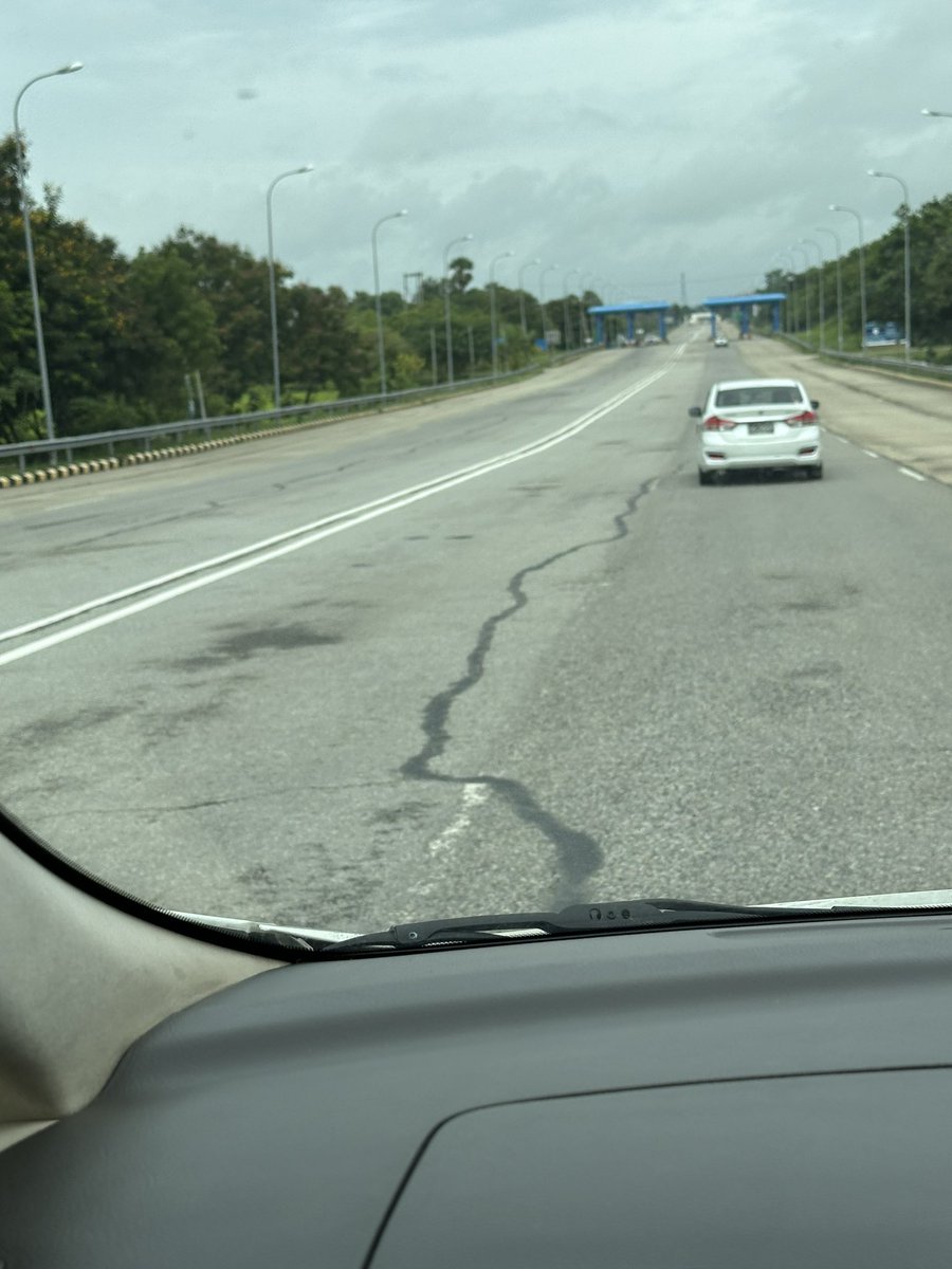 The long road from Yangon to NayPyiTaw - for the first ever Myanmar Peace Forum involving foreign experts. 
Signs of cracks on the road from the great earthquake of March this year.