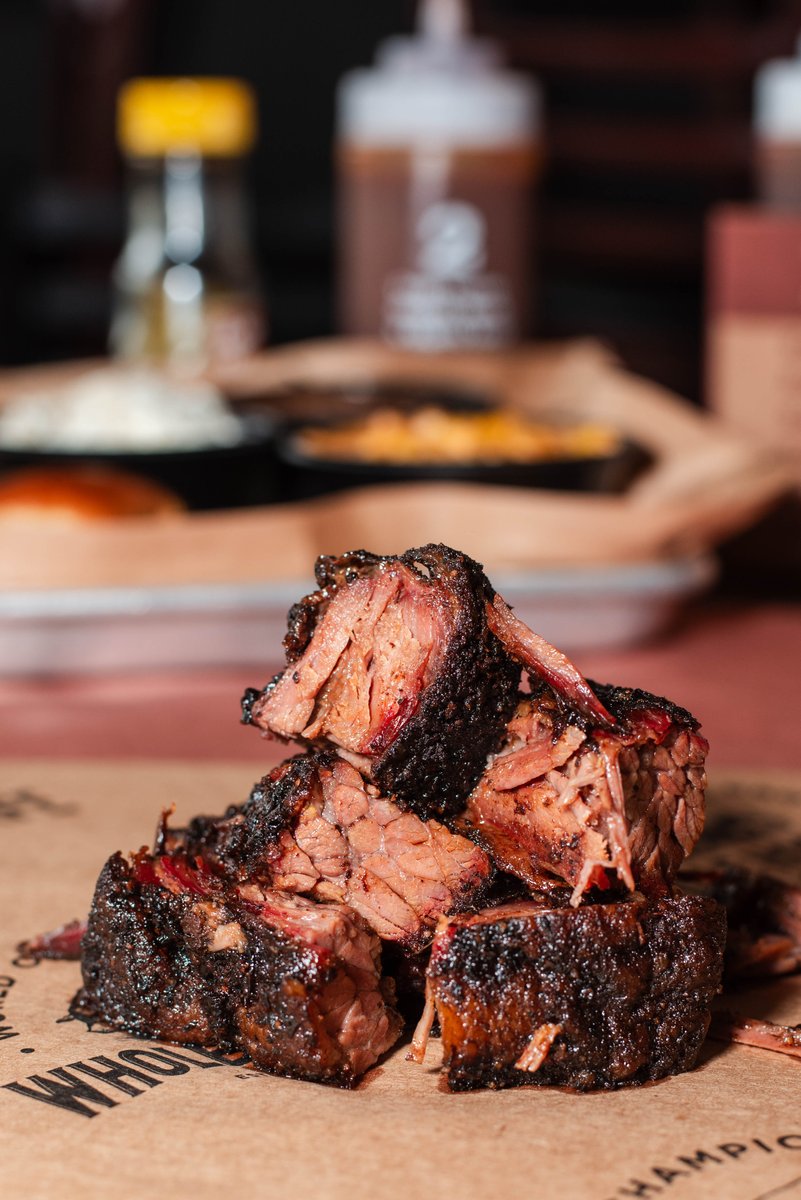 Burnt Ends. Enjoy the view, now come and enjoy them at Whole Hog 🔥 Don't miss out on these delicious treats! Available daily until sold out. 
📱Order online and app / wholehogcafe.com
#wearethewholehog #arkansasbbq #BBQNation #bbqlovers #hogheaven #25in25