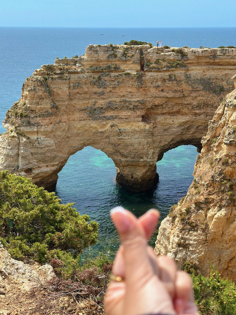 Heart-shaped love for this stunning coastal arch💙 #NatureLovers #Travel #Portugal