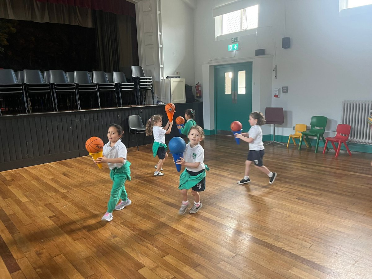 Junior Infants used cones and basketballs to make imaginary ice-creams and practise their balancing skills!