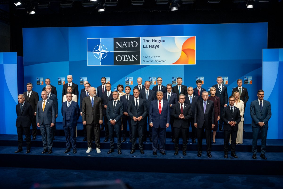 WhiteHouse's tweet photo. HISTORIC WIN! President Donald J. Trump at the 2025 @NATO Summit, securing a 5% defense spending commitment from NATO allies. 🇺🇸 https://t.co/knWg5LcyOq