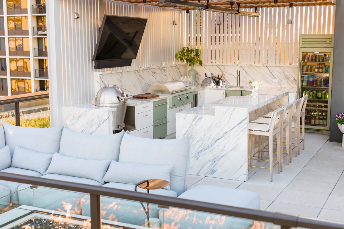 We invite you to explore this dreamy 900+ sq ft roof deck designed in conjunction with Rebel House Interior Design, True Residential, and Cosentino! This outdoor paradise features a kitchen finished in our Venice door style and White Silk powder coat.
danver.com