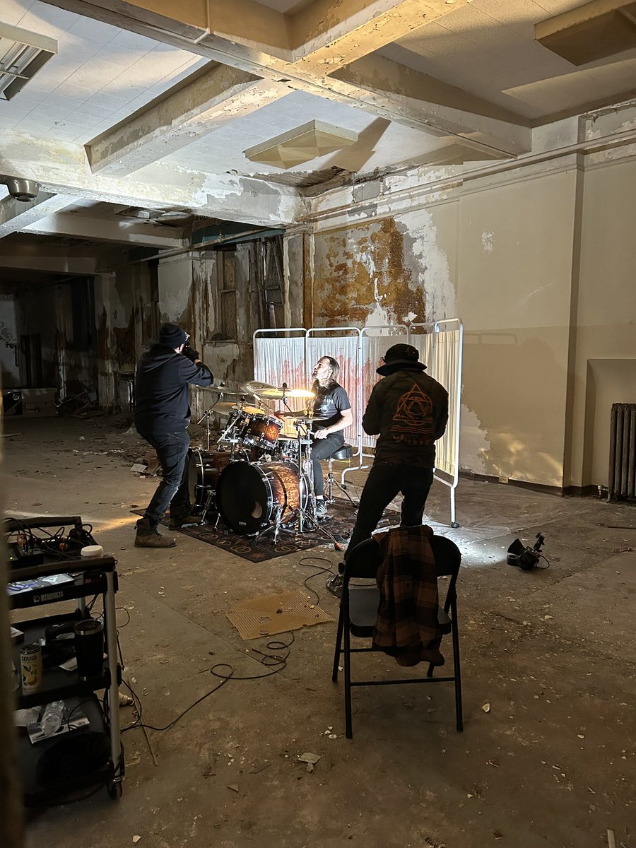 Revocation's tweet image. BTS at the “Cronenberged” video shoot