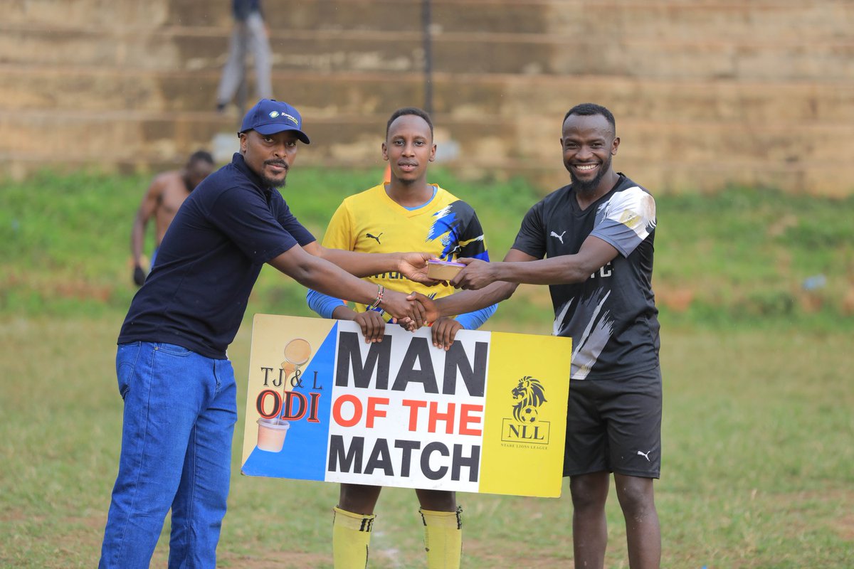 TJ &L odi (@tjl_odi) on Twitter photo Frame 1: #Starboy Arode receives his MOTM award from <a href="/StevenNuwagira/">S. Nuwagira</a> of <a href="/NLL_Echoes/">NLL Echoes</a>
Frame 3: Job vibrantly steps forward to receive his award 4rm Benjiku of <a href="/SC_Jabulani/">CD_JABULANI</a>
Frame 4: <a href="/SethNuwahereza/">nuwahereza seth</a> awards Abott of <a href="/FcNturi/">Nturi FC</a> as his team mate Kashoma witnesses <a href="/ntare_league/">Ntare Lions League</a> <a href="/NLLNews/">NLL News</a> Frame 1: #Starboy Arode receives his MOTM award from <a href="/StevenNuwagira/">S. Nuwagira</a> of <a href="/NLL_Echoes/">NLL Echoes</a>
Frame 3: Job vibrantly steps forward to receive his award 4rm Benjiku of <a href="/SC_Jabulani/">CD_JABULANI</a>
Frame 4: <a href="/SethNuwahereza/">nuwahereza seth</a> awards Abott of <a href="/FcNturi/">Nturi FC</a> as his team mate Kashoma witnesses <a href="/ntare_league/">Ntare Lions League</a> <a href="/NLLNews/">NLL News</a>