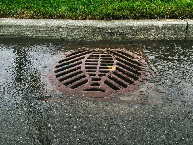 Catch basin being flooded with water.