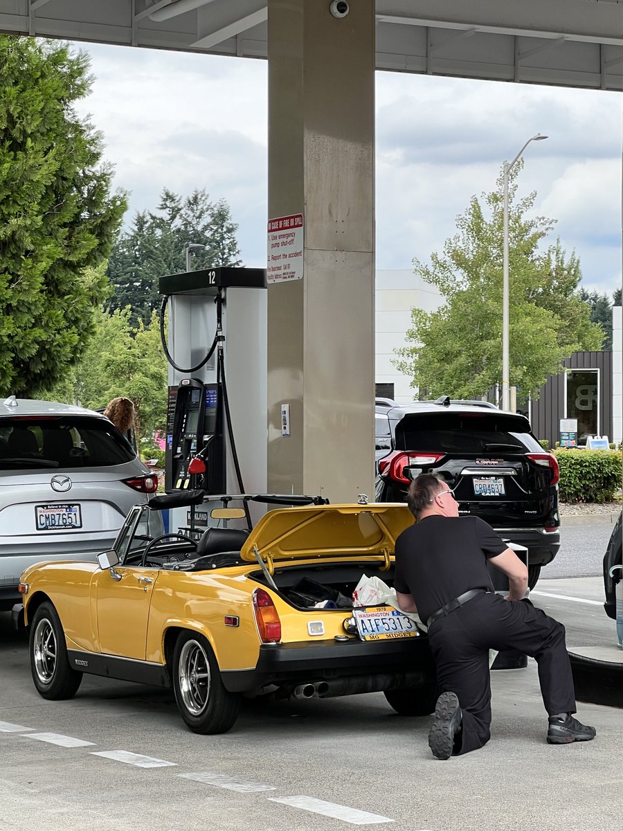 NancyPettit's tweet photo. MG Midget getting gassed @Costco #tinycar $3.84/gallon today https://t.co/FzJzczCH1N