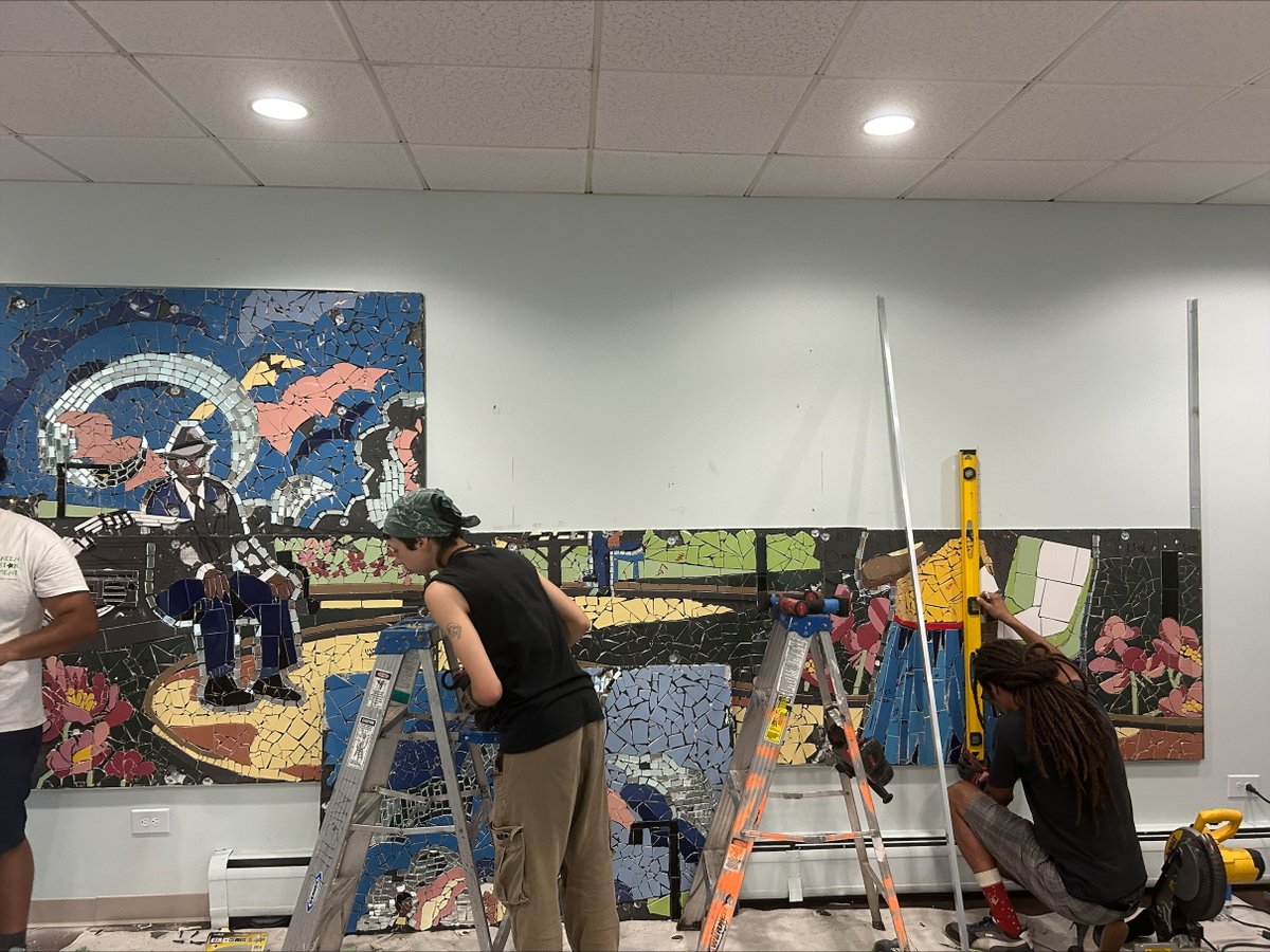 Residents, staff and the Green Star Movement team are completing a new mosaic mural at POAH's Farrell House  in Chicago. Over 3 1/2 months, the group designed and assembled mosaic pieces for the mural, now being hung in the lobby. Final touches should be in place this week
