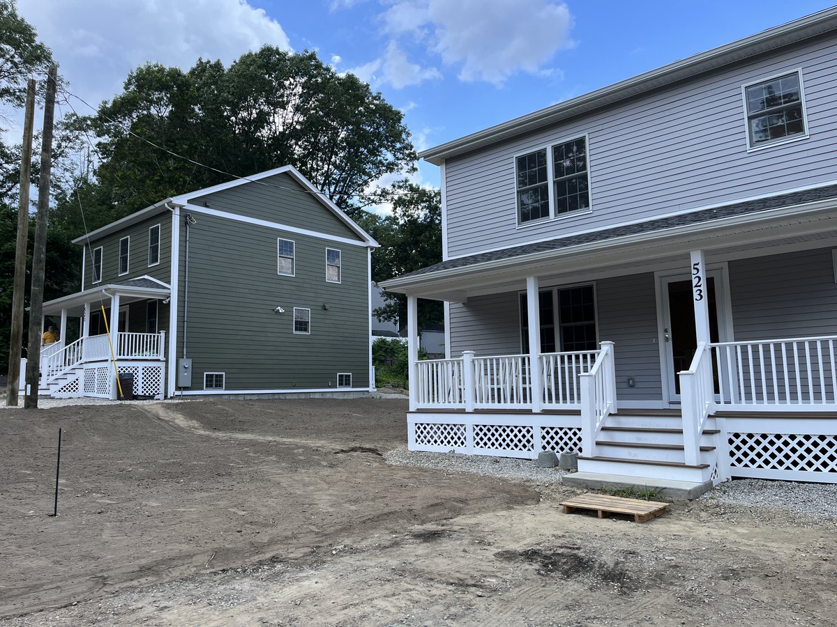 The weather outside yesterday was toasty, but it was nice and cool indoors for the many that gathered at 521 &amp; 523 Sunderland Rd, Worcester to welcome two very happy and grateful families to their new home. Volunteer, sponsor, donate to a home build, visit habitatmwgw.org