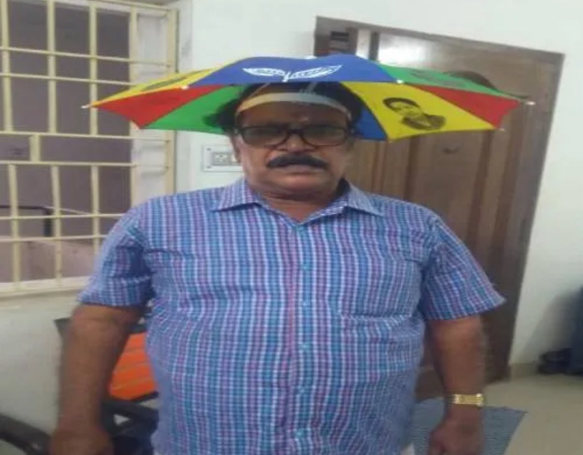 LarryHapsburger's tweet photo. @GusMcDonald72 I’d have to say the head umbrella! https://t.co/VnJ1TQLb5G