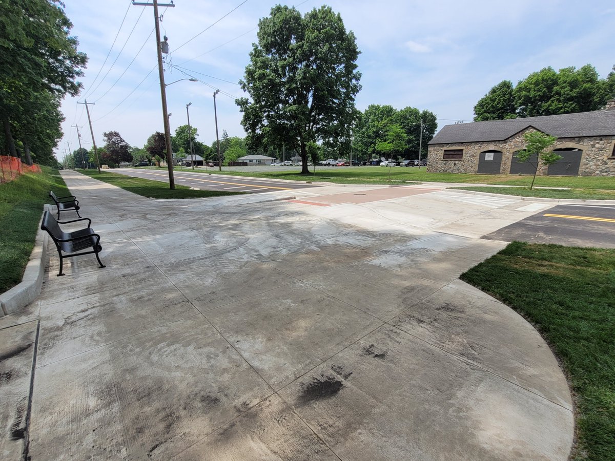 The Ewing Avenue streetscape project in South Bend is nearing completion.  Work included adding a shared-use sidepath, narrowing the wide street, and completing other traffic calming, including the addition of raised pedestrian crossings.
