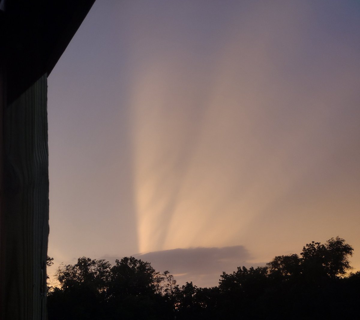 Seconds after I took this picture, a lightning bolt struck across the sky and split like tree roots, it was insane (the sky looks more orange irl)